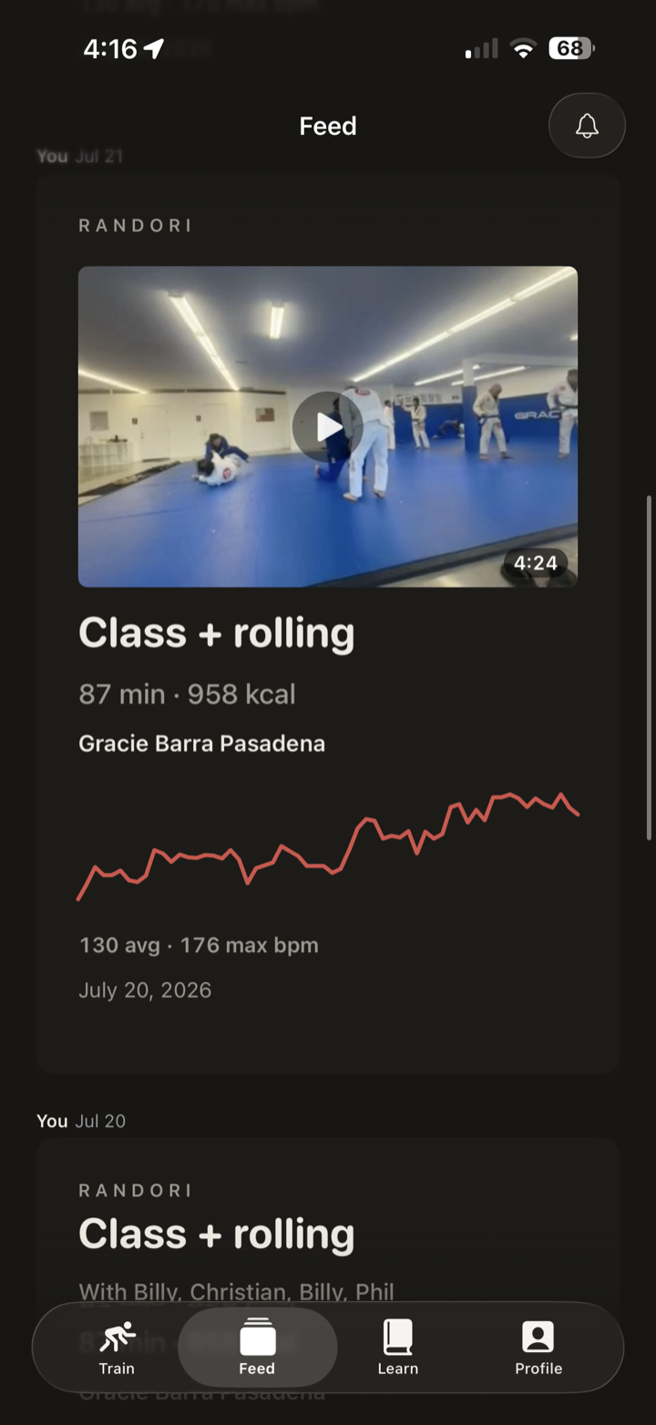 A session post with its heart-rate trace, 87 minutes and 958 calories